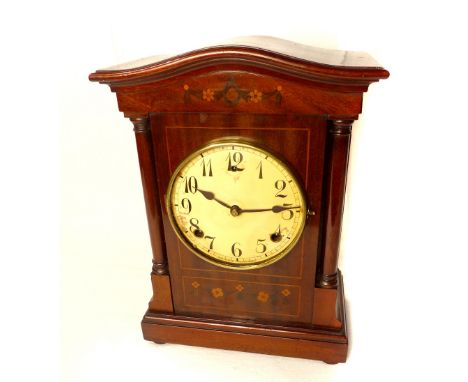 American W. Gilbert mahogany mantel clock, floral swag decoration, cream dial flanked by column, openwork mechanism striking 