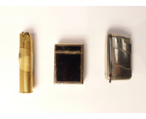 Dunhill gilt metal lighter, engine turned design, a DeLuxe black and gilt lighter and lighter with incorporated pocket knife