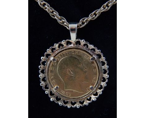 A Edward VII gold sovereign, 1906, set in a 9ct yellow gold mount pendant and chain, in total 26.4g