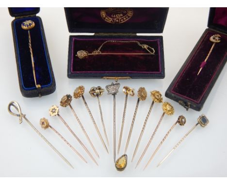 Quantity of Victorian and later 15ct yellow gold stick pins, set with diamonds and split pearl finials etc., together with ye