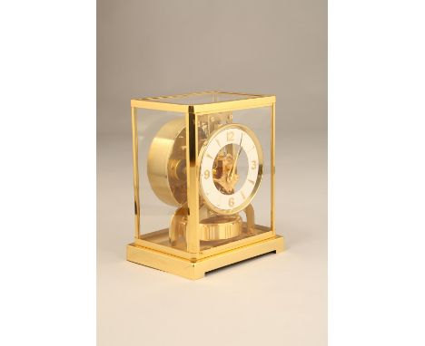 Jaeger Lecoultre Atmos clock, gilt brass case, white chapter ring with gilt numbers and hour batons, No 267009. 22.5cm high T