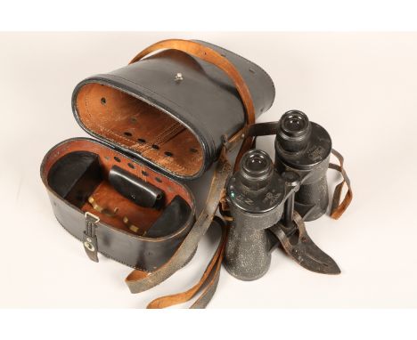 A pair of German WWII U-boat binoculars, by Carl Zeiss 7 x 50 with impressed swastika M in original leather fitted case No 21