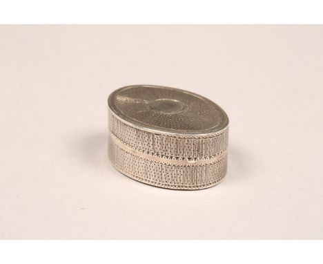 George III silver vinaigrette, oval form and engine turned decoration, assay marked London 1798. 32mm long, 29mm wide, 14mm h