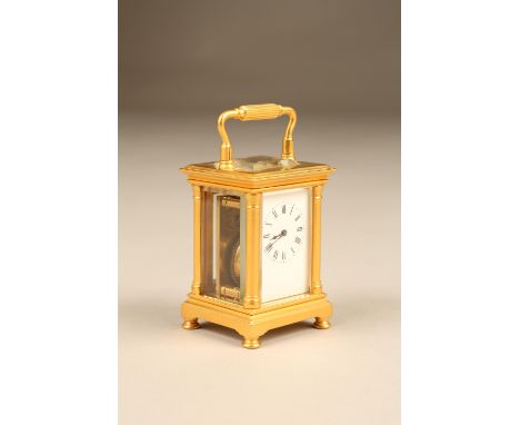 Minature French brass carriage clock, white enamel rim, with Roman numerals, stamped for Richard cie Paris, height 10cm inclu