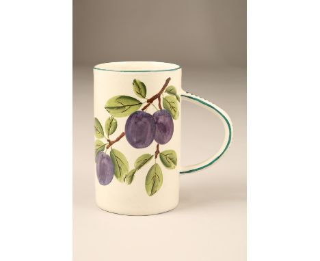 Scottish Wemyss Pottery tankard, cylindrical form, hand painted with plums signed Wemyss to base. 16.5cm high The wemyss tank