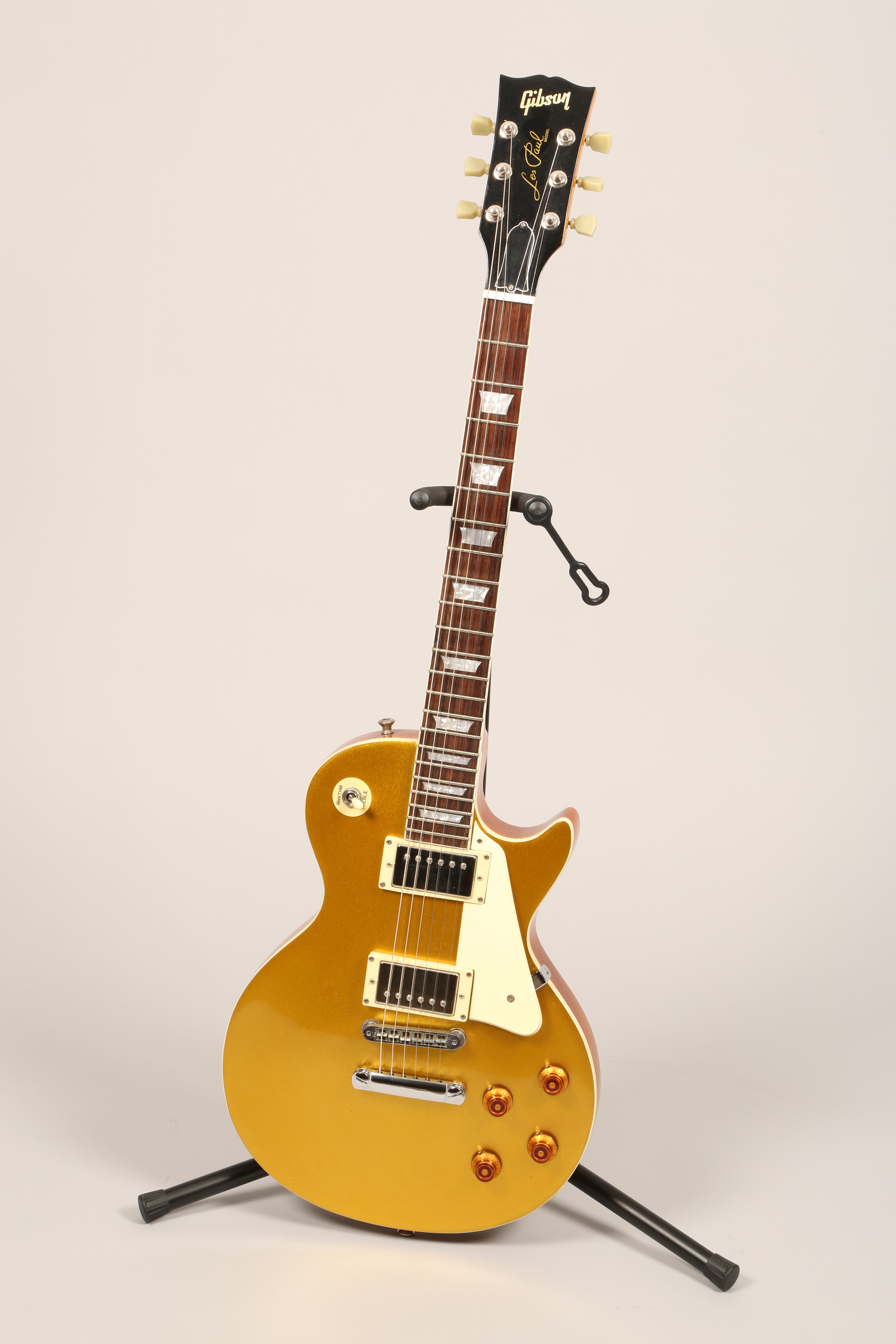 Gibson Les Paul metallic gold, white pickguard with trapezoid inlay