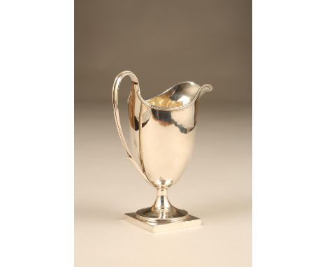 George III silver cream jug, helmet shaped with a square base, assay marked London 1809, Henry Chawner, 184g Item is in a ver