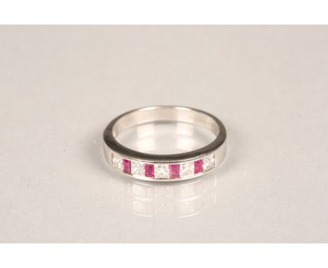 Ladies 18 carat white gold ruby and diamond eternity ring, five diamonds and four rubies. Ring size O