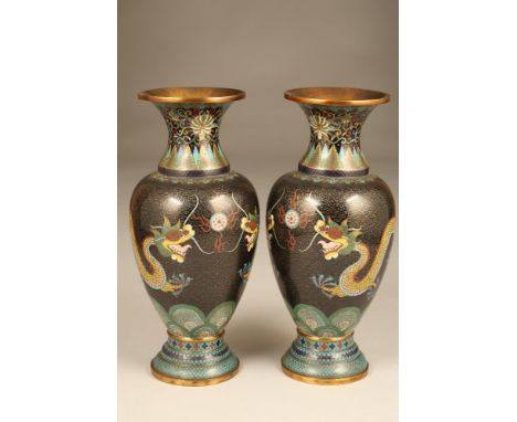 Pair Japanese cloisonné vases, baluster shaped black background with two dragons Both vases are in very good condition. Both 