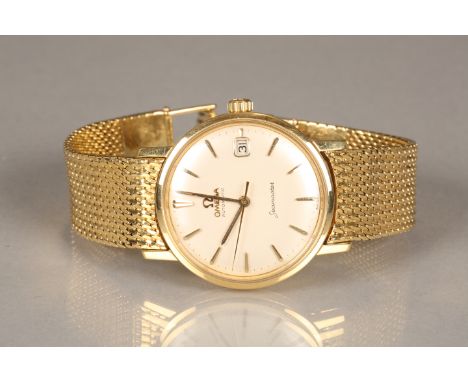 Gents 18 carat gold Omega Seamaster wrist watch, with original 18 carat gold bracelet strap, cream dial, gilt baton hour mark