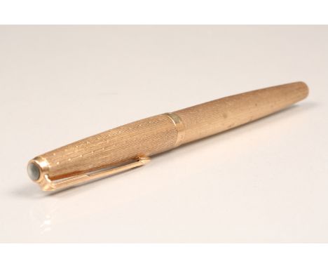 Cased 9 carat gold Parker fountain pen with engine turned decoration 13.3cm long The fountain pen is excellent condition stam