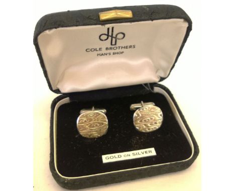 Gentlemens gold on silver cufflinks in original box.
