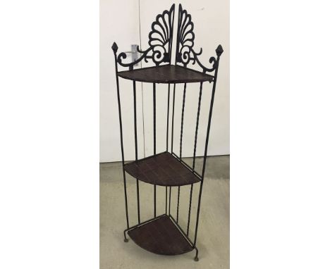 A black wrought iron 3 tier folding corner shelf