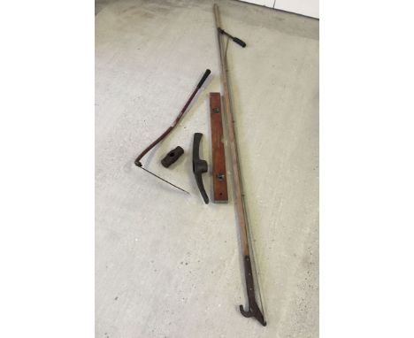A vintage wooden spirit level approx 80cm long, together with a pick axe head, a sledgehammer head, a pair of Spear and Jacks