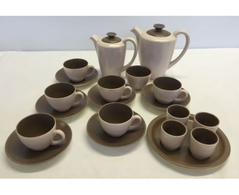 A Poole breakfast set comprising coffee pot, water pot, 6 coffee cups and saucers, sugar bowl & 4 egg cups with plate. In bro