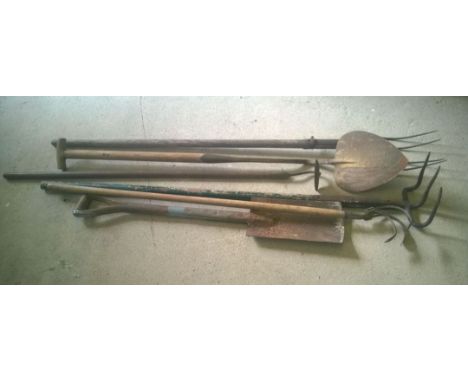 6 large wooden handled garden tools to include peat shovel forks and hoes.