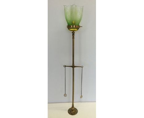 Converted brass lamp with glass light shade