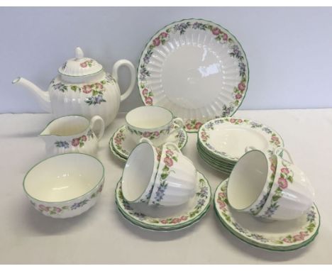 A Royal Worcester English Garden part tea set comprising; teapot, sandwich plate, milk jug, sugar bowl, 6 tea plates, 5 cups 