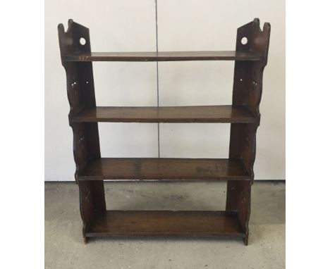 A vintage oak 4 shelf wall unit