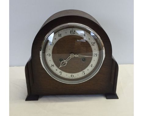 An Enfield Mantle clock with key, in working order