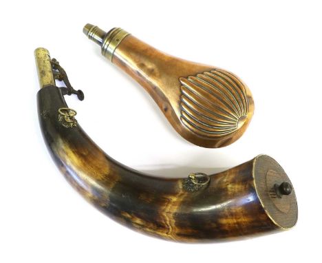 An Early 19th Century Powder Horn, of polished striated cow horn, with oak base plate, twin brass suspension rings with back 