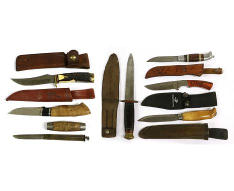 A Second World War Fighting Knife, the 17cm double edge steel blade with raised medial ridge, stamped TAYLOR, WITNESS, SHEFFI