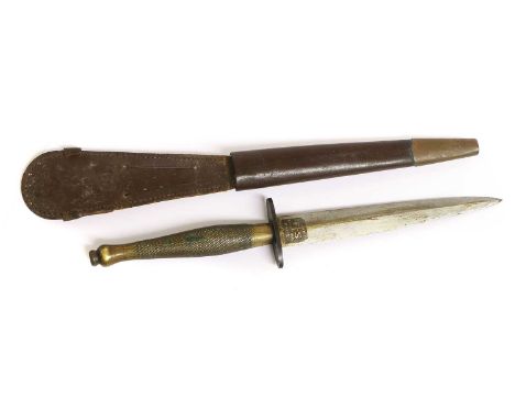 A Second World War Fairbairn Sykes Fighting Knife, Second Pattern, the 17cm hand forged steel blade with recessed panel to th