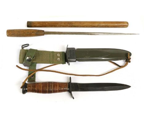 A US M3 Combat Knife, the 16cm blued steel blade and crossguard stamped U.S. M3, with seven groove stacked washers grip, gree