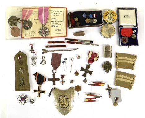 A Collection of Polish Medals and Badges, including a Cross of Valour with two miniatures, a Monte Cassino Commemorative Cros