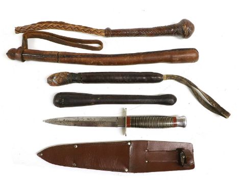 A US Type Fighting Knife, with 15cm double edge steel blade, nickel crossguard, with brass, black and terracotta banded grip 