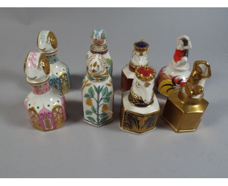 A Collection of Eight Minton Ceramic Perfume Bottles with Unicorn, Ram and Quail Finials 