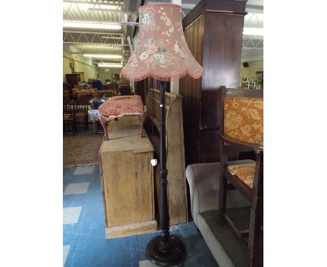 An Ebonised Turned Wooden Standard Lamp 