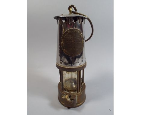 A Brass Miners Lamp, by The Protector Lamp and Lighting Company