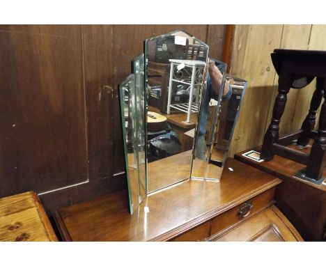 An Art Deco style bevelled edge mirror