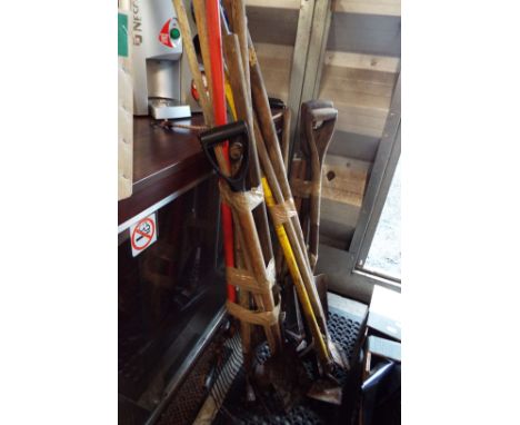 Three bundles of garden tools to include spades, hoes, rakes, sledgehammer etc