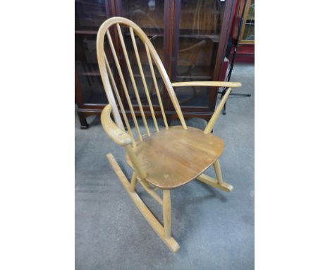 An Ercol Blonde elm and beech Quaker rocking chair 