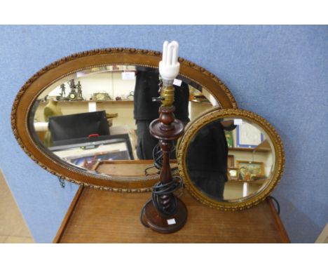 Two gilt framed mirrors and a mahogany barleytwist table lamp 