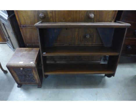 A carved oak purdonium and a hanging oak wall shelf 