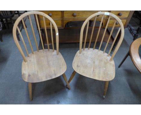 A pair of Ercol Blonde elm and beech Windsor chairs 