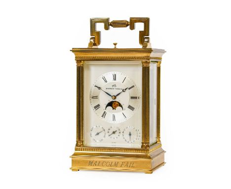 A Brass Strike and Repeat Alarm Calendar Carriage Clock with Moonphase Display, signed Matthew Norman, 20th century, carrying