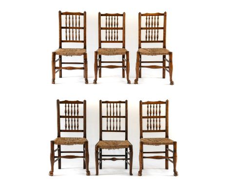 A Harlequin Set of Six 19th Century Ash and Rush-Seated Spindle-Back Dining Chairs, Lancashire/Cheshire Region, the comb shap