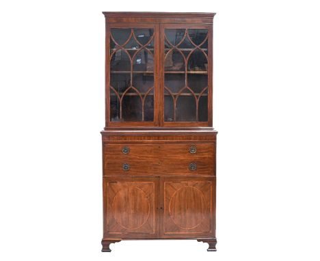 A George III Mahogany Secretaire Bookcase, the upper section with a cavetto cornice above a pair of rosewood and boxwood-stru