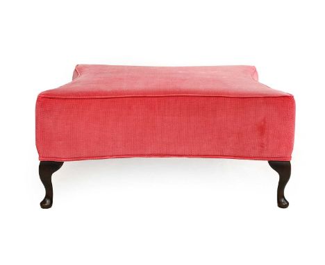 G &amp; M Lawrence Furnishings: A Pink Upholstered Overstuffed Footstool, modern, of serpentine-shaped form, on stained beech