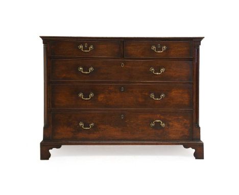 A Late George III Walnut Straight Front Chest of Drawers, circa 1800, the moulded top above two short and three pine-lined dr