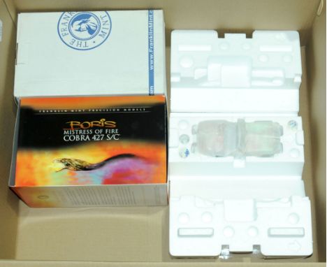 Franklin Mint, a boxed 1:24 scale Cobra 427SC "Boris Mistress of Fire" complete with Tool and Gloves. Although not checked fo