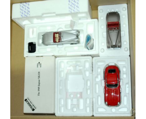 Franklin Mint &amp; Danbury Mint. A group of boxed/part boxed 1:24 scale Jaguar models comprising of Danbury Mint 1949 Jaguar