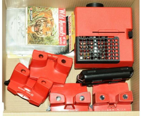 Vintage Viewmaster. A vintage group of Viewmaster items to include 4x hand held viewers, along with a harder to find battery 
