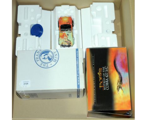 Franklin Mint, a boxed 1:24 scale Cobra 427SC "Boris Mistress of Fire" complete with Tool and Gloves. Although not checked fo
