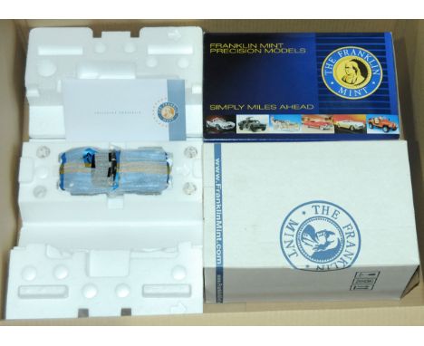 Franklin Mint 1/24th scale Shelby Cobra 427 S/C Limited Edition model - metallic blue with twin gold stripes. Complete with T