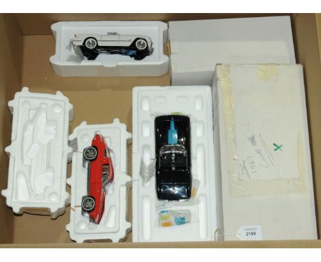 Franklin Mint. A partially boxed group of 1:24 scale Corvette models to include 1967 Corvette in Black, 1953 Corvette in Crea